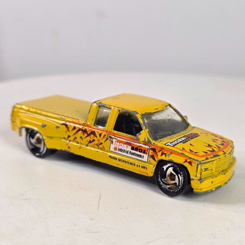 Hot Wheels 1997 Custom Chevy C3500 Diecast Truck Yellow W/ Thorn Bros Decals